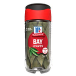 Dried McCormick bay leaves in a 3g package, used for flavoring in cooking, with the McCormick brand label visible.