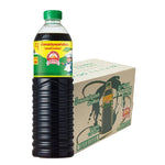 Golden Mountain Seasoning Sauce in green cap, 1L bottles, stacked in a grocery display, showcasing the dry grocery product.