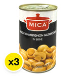 Cans of MICA Whole Champignon Mushrooms in brine, 400g each, stacked in a row for dry grocery use.