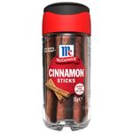McCormick cinnamon sticks stacked in a clear jar, showcasing their rich brown color and textured surface for cooking and baking.