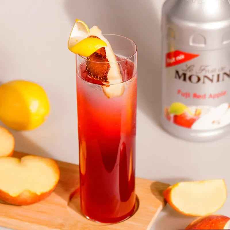 Monin Fuji Red Apple fruit mix bottle, 1000ml, in dry grocery category, showcasing vibrant red apple flavor and branding.