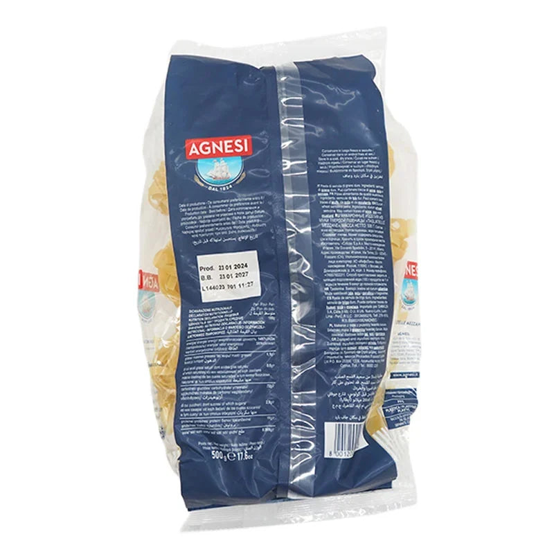 Dry Agnesi Tagliatelle Mezzane pasta in 500g package, showing the uncooked, flat, ribbon-shaped Italian pasta on a white background.