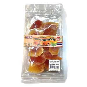 Dehydrated papaya slices from Bn Fruit confectionery snacks, showcasing vibrant orange dried fruit pieces on a white background.