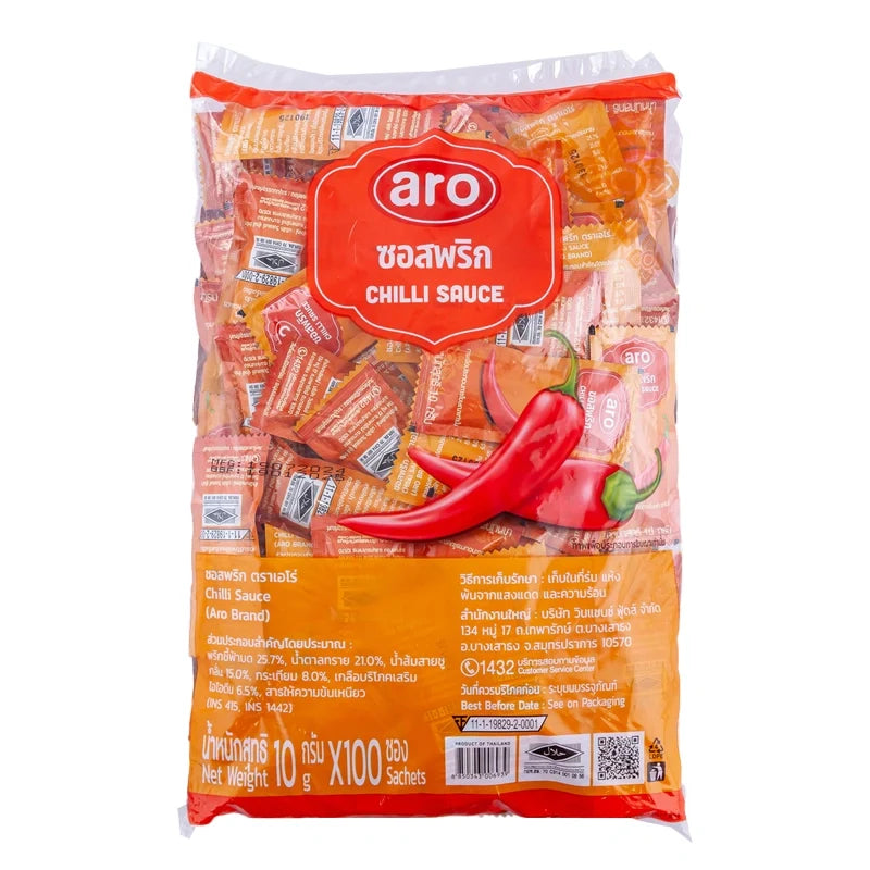 Aro Chilli Sauce 10g packet in dry grocery section, featuring bright red chili sauce inside a small packet.