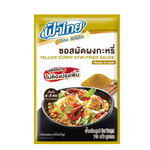 Fathai Yellow Curry Stir-Fried Sauce in a jar, featuring vibrant yellow color and Thai-inspired packaging for grocery use.