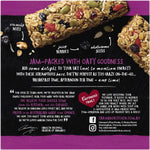 Carman's Super Berry Muesli Bars displayed on a white background, showcasing the healthy snack with berry and oat ingredients.