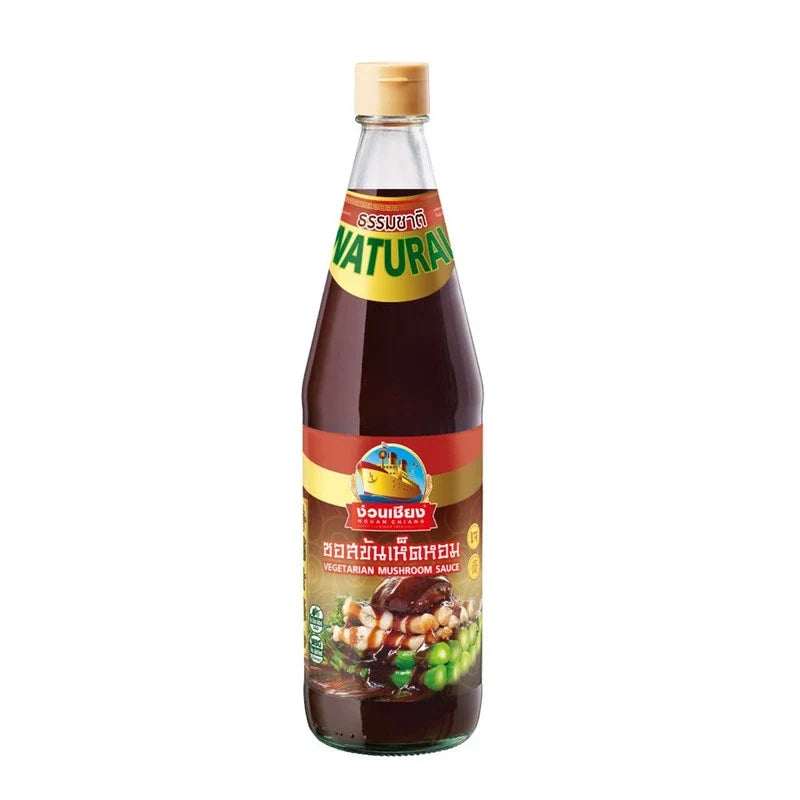 Nguan Chiang Vegetarian Mushroom Sauce 800g jar, close-up view showing the label and lid, in a dry grocery setting.