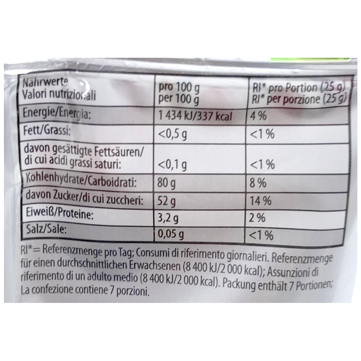 Haribo Saure Pommes confectionery snacks with sour apple-shaped gummy candies in bright green and red colors.