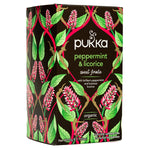 Pukka peppermint and licorice tea bags in a box, caffeine-free herbal tea, healthy drink option, natural ingredients visible.