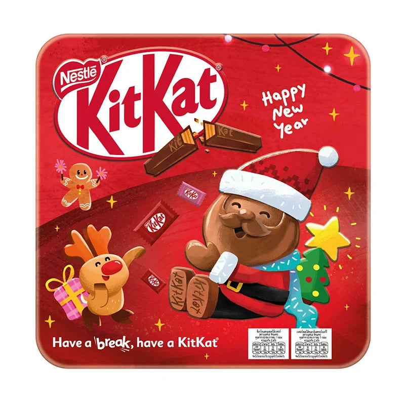 KITKAT Chocolate Festive Tin Box 85g featuring wrapped KitKat bars in a decorative holiday-themed tin.