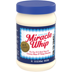 Kraft Miracle Whip mayonnaise jar with label visible, on a grocery store shelf, showcasing the creamy white condiment.