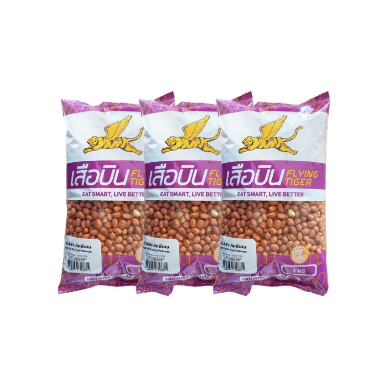 Flying Tiger Peanuts 1kg in a clear bag, dry grocery snack, showing roasted peanuts ready for snacking or cooking use.