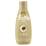 Hearty Spoon Truffle Mayo in a jar, creamy and rich, perfect for spreading or adding flavor to gourmet dishes.