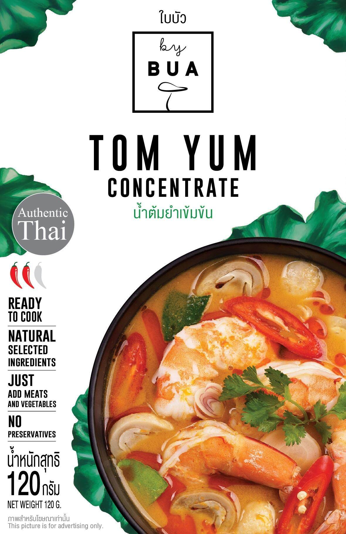 Bottle of By Bua Tom Yum Concentrate for flavorful Thai soup, with red and green chili peppers and herbs visible in the image.