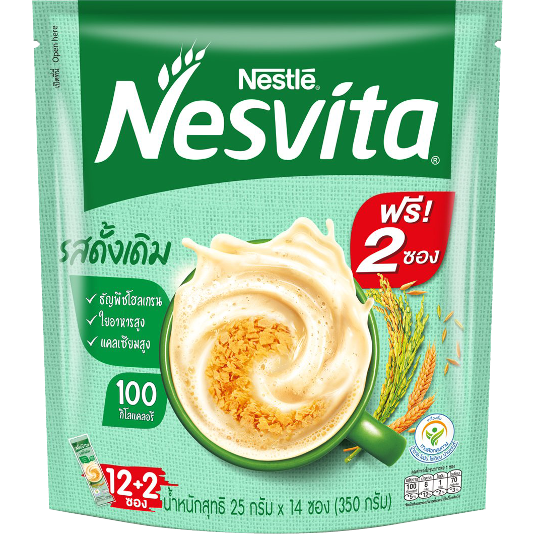 Nesvita Instant Cereal Drink Original in a glass, showing a creamy, frothy cereal beverage with a spoon nearby.