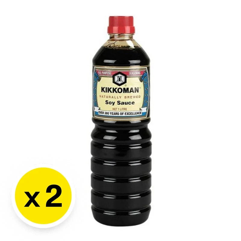 Two bottles of Kikkoman soy sauce, 1 liter each, with dark soy sauce in clear glass bottles labeled with the Kikkoman logo.