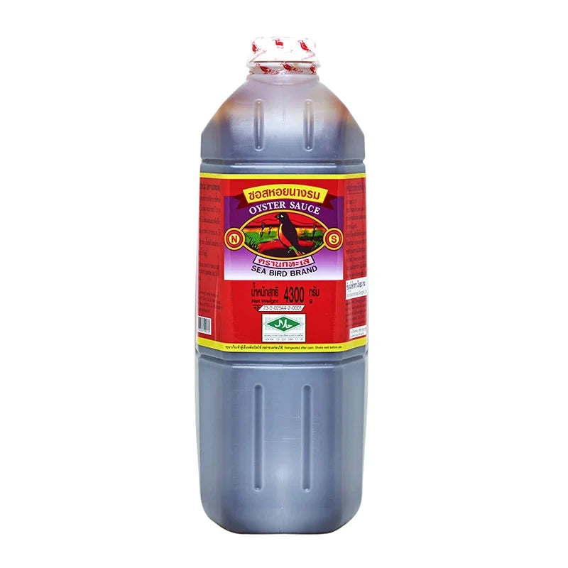 SEA BIRD Oyster Sauce 4.3L bottle for stir-fry and cooking, featuring a dark brown sauce in a clear plastic bottle.