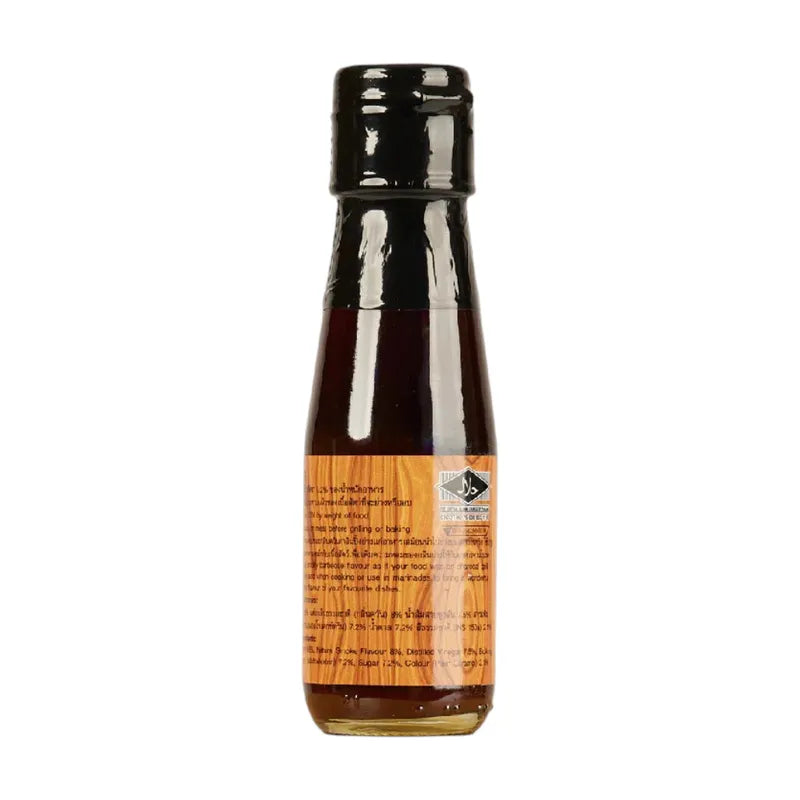 Lobo Liquid Smoke bottle, dry grocery product with black cap and clear label, used for adding smoky flavor to dishes.