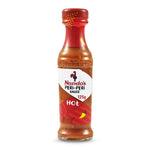 Bottle of Nando's Hot Peri-Peri Sauce with red cap and label, showcasing the spicy Peri-Peri sauce from Nando's brand.