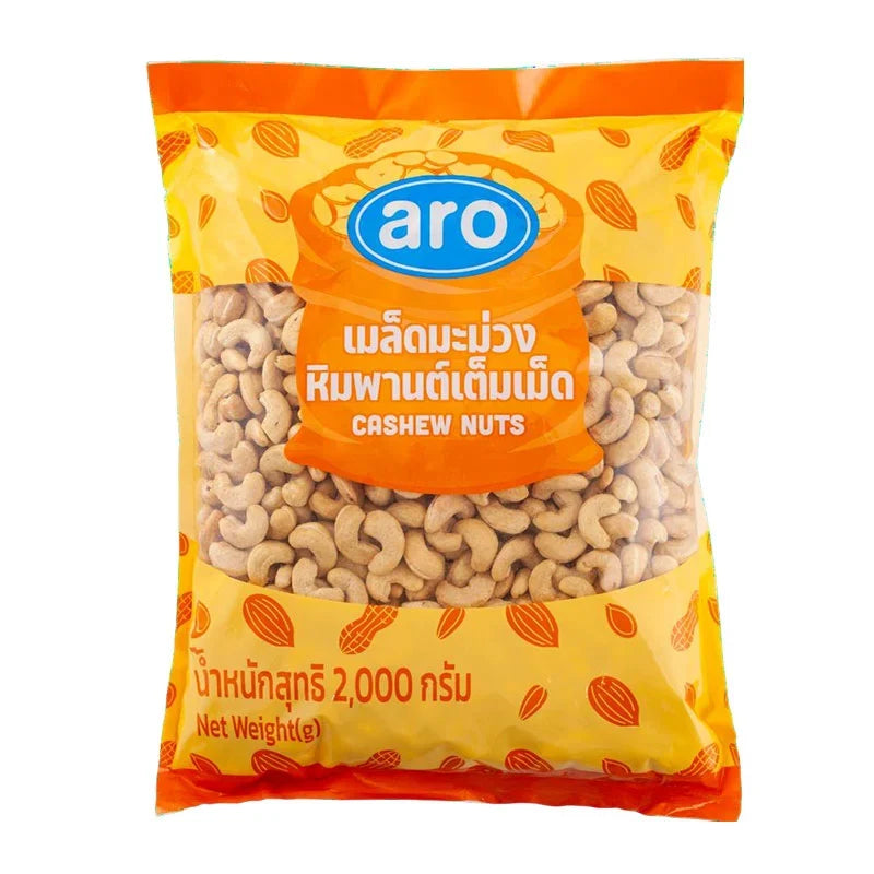 Aro Cashew Nuts 2kg package in dry grocery section, showing a clear view of the whole, raw cashew nuts in a sealed bag.