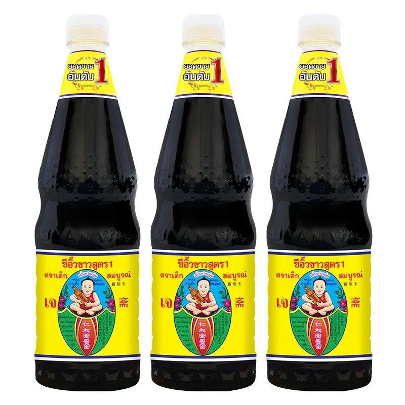 Three bottles of DEK SOM Boon Soy Sauce Formula 1L, dry grocery, with soy sauce bottles featuring labels and caps.