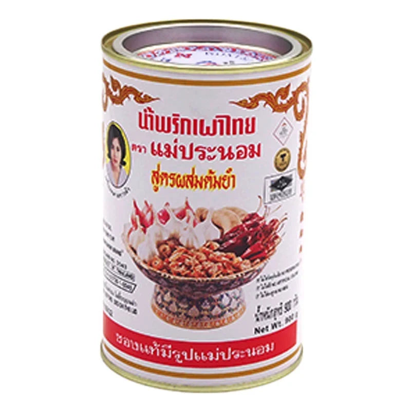 Maepranom Chili Paste Tom Yum in 900g jar, traditional Thai dry grocery, vibrant red chili paste with herbs and spices.