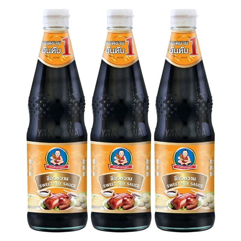 DEK SOM BOON Boon Sweet Sauce 970g, three bottles, dry grocery product with dark, glossy sauce in plastic bottles.