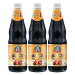 DEK SOM BOON Boon Sweet Sauce 970g, three bottles, dry grocery product with dark, glossy sauce in plastic bottles.