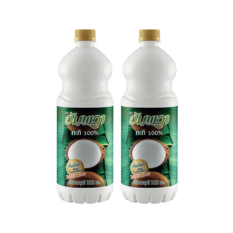 Ampawa Coconut Milk Pet 1L bottles for cooking, with two 1-liter containers shown, ideal for dry grocery use.