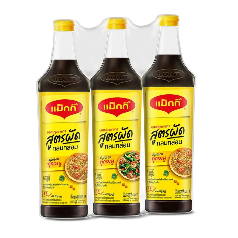 Three bottles of MAGGI Seasoning Sauce, 680ml each, showing the dark liquid inside transparent bottles in a dry grocery setting.