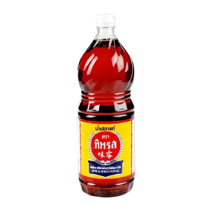 Tiparos Fish Sauce 1.5L bottle from Tiparos, used for cooking and flavoring in Asian cuisine, in a clear plastic bottle.