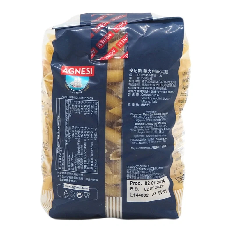 Dry Agnesi Penne Rigate No.19 pasta in 500g package, showcasing uncooked, ridged Italian pasta from the Agnesi brand.