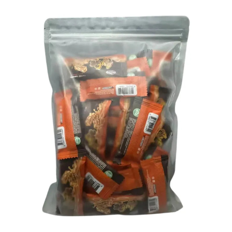 Nezline Toffee Caramel Nut Crisp snack in a clear wrapper with visible caramel, nuts, and crispy texture.