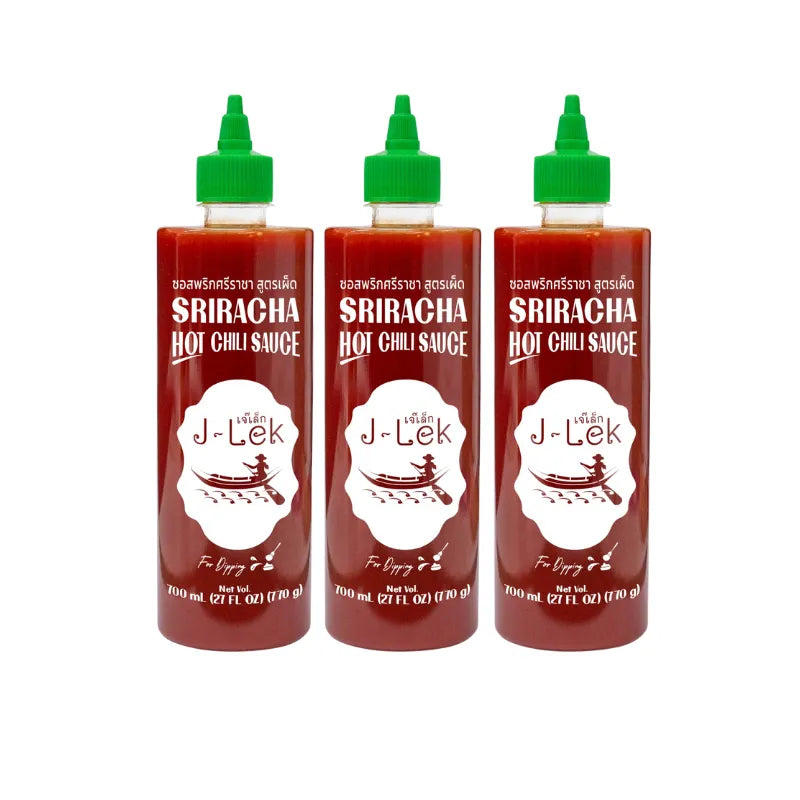 J-lek Sriracha Chili Sauce bottle showing spicy red chili sauce in 820g squeeze bottle, dry grocery product with label and cap
