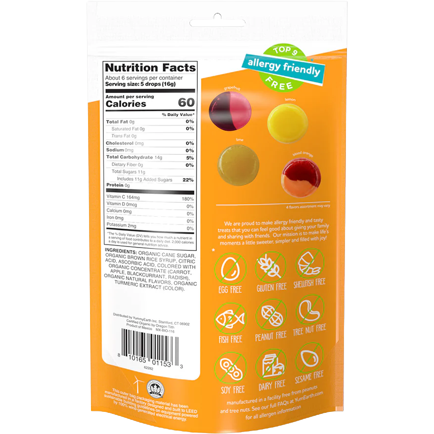 YumEarth Organic Citrus Grove Vitamin C Drops candies in colorful packaging, featuring citrus fruit illustrations on a white background.