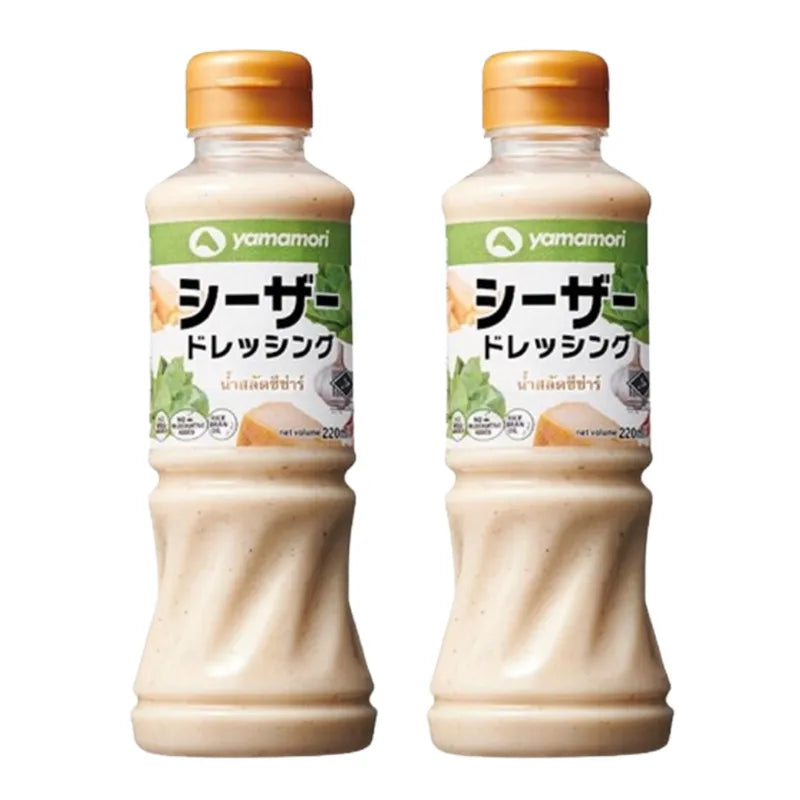 Yamamori Caesar Salad Dressing 220ml bottle, shown in a pair, from the dry grocery section, with a label featuring the Yamamori brand.
