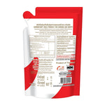 CARNATION evaporated milk 1kg tin, dry grocery product with label showing brand and product details.