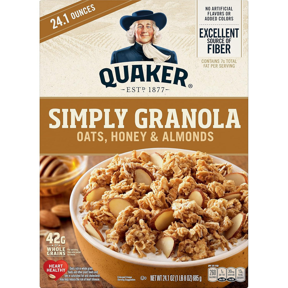 Quaker Simply Granola Honey & Almond flavor in a clear bowl, showing crunchy granola with honey and almond pieces.
