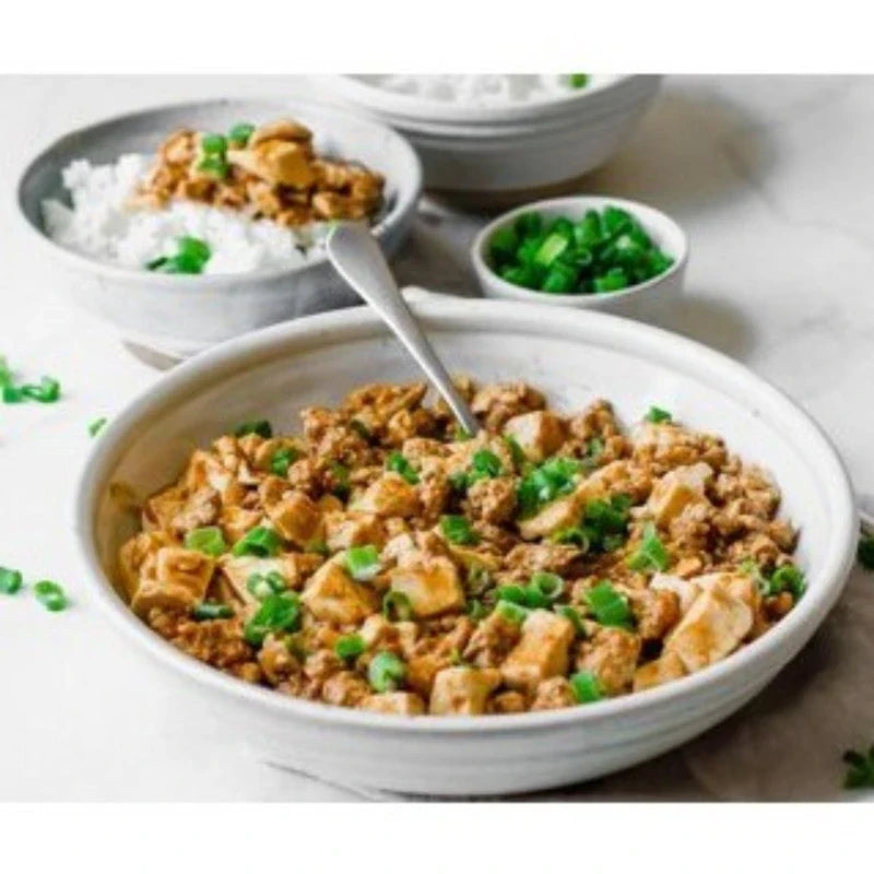 House Mabo Tofu Nikunashi Medium Hot 150g dry grocery product, showing the packaged tofu with label and branding.