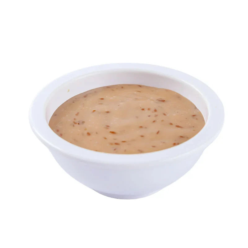 ARO Sesame Dressing 500g bottle, a dry grocery condiment with sesame seeds, displayed in a clear container.