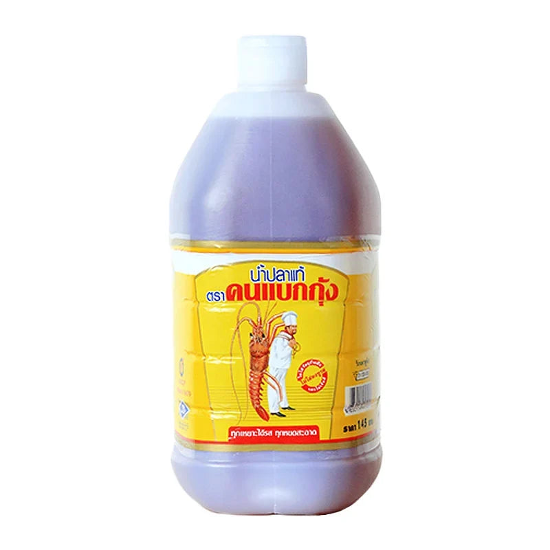 Bottle of COOK&LOBSTER Fish Sauce 4.5L for cooking, with a clear label and cap, in a grocery setting.