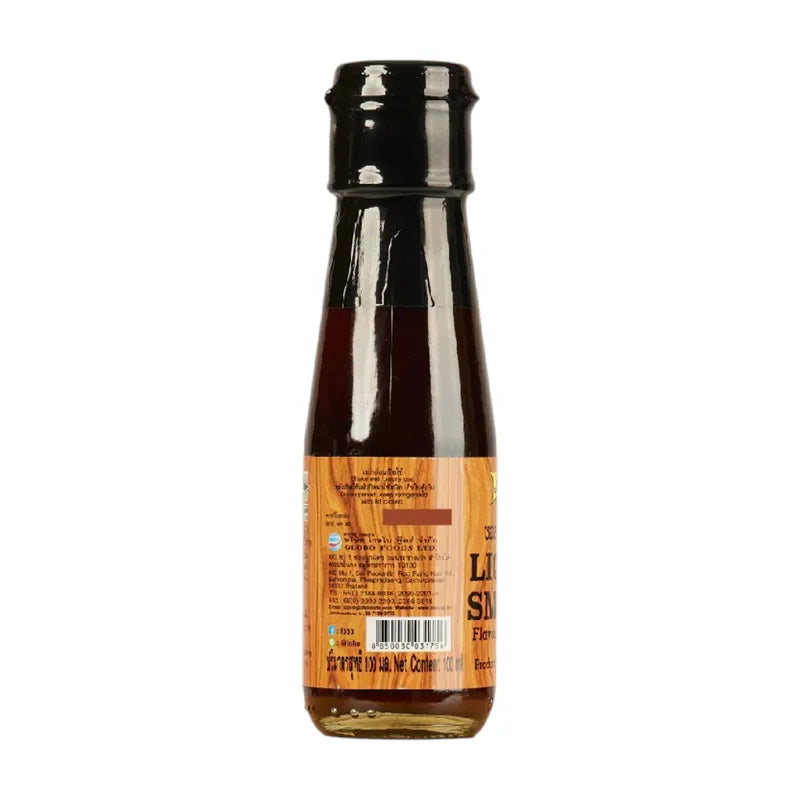Lobo Liquid Smoke in a bottle, used as a flavor enhancer for grilling and cooking, part of dry grocery products.