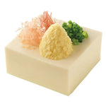 S&B coarsely grated raw ginger with brewed vinegar in a clear jar, ready for use in cooking or as a condiment.