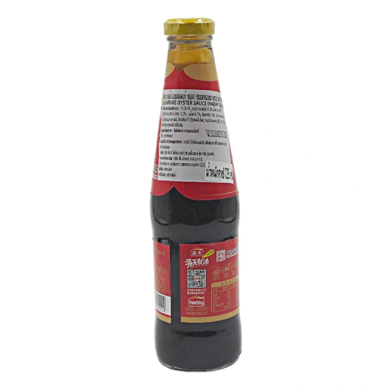 Haday Oyster Sauce 725g jar, featuring a dark brown sauce in a clear glass bottle with a yellow label, on a white background.
