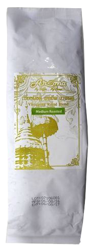 Aroma Viengping Medium drink in a clear glass bottle with a label, showcasing the beverage's golden color and branding.