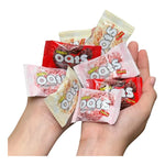 Nezline oat ring snack coated with chocolate milk, featuring a crispy oat exterior and creamy chocolate flavor.