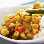 S & B Curry Sauce with Vegetables and ready-made potatoes in a dry grocery package, ready for cooking and flavoring meals.