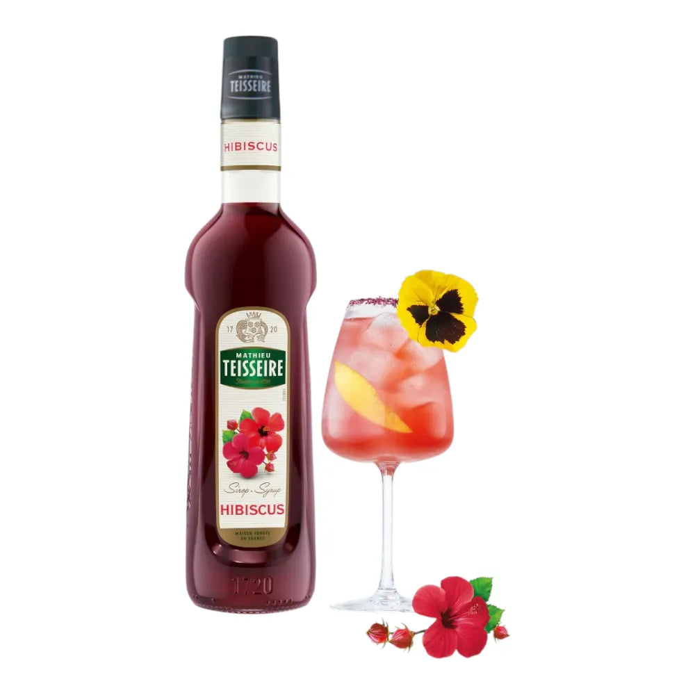 Mathieu Teisseire Hibiscus Syrup 700ml bottle, vibrant red liquid, ideal for beverages and culinary uses in dry grocery section.