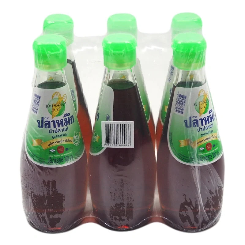 Six 300ml bottles of Squid Brand Fish Sauce, a popular Thai dry grocery condiment with rich umami flavor.