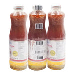 Maepranom Chicken Sauce in 980g bottles, featuring a dark, savory liquid with a label displaying the MAEPRANOM brand name.